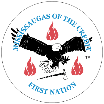 Logo for Mississaugas of the Credit First Nation with bald eagle in the centre, three flame symbols and an axe.