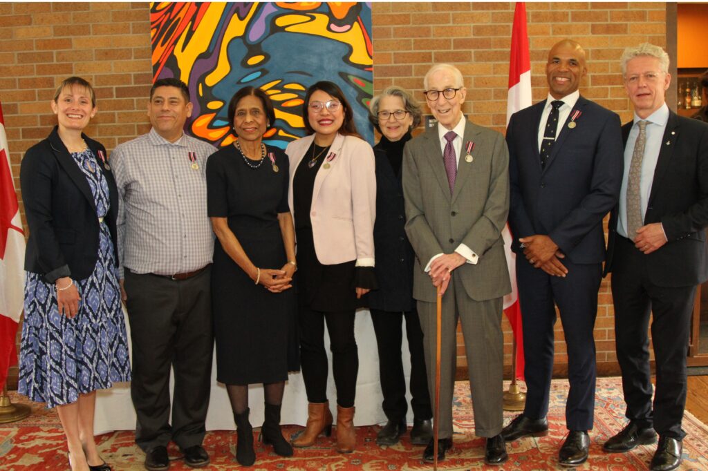 L to R Alexandra Sorin, David Landaverde, Nalini Stewart, Christine Tran, Mary McGeer, Peter Lewis, Akwasi Owusu-Bempah and James Orbinski