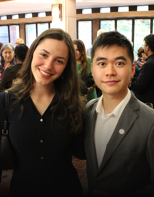 Two Junior Fellowship students stand together smiling